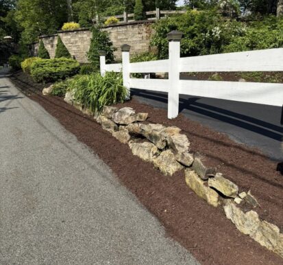 Mulch w white fence